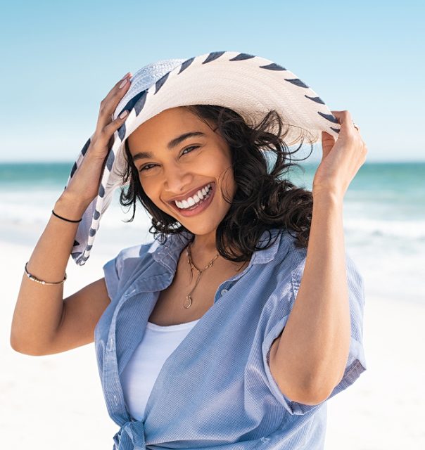 Woman smiling on the beach