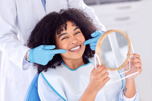 woman smiling at dentist office